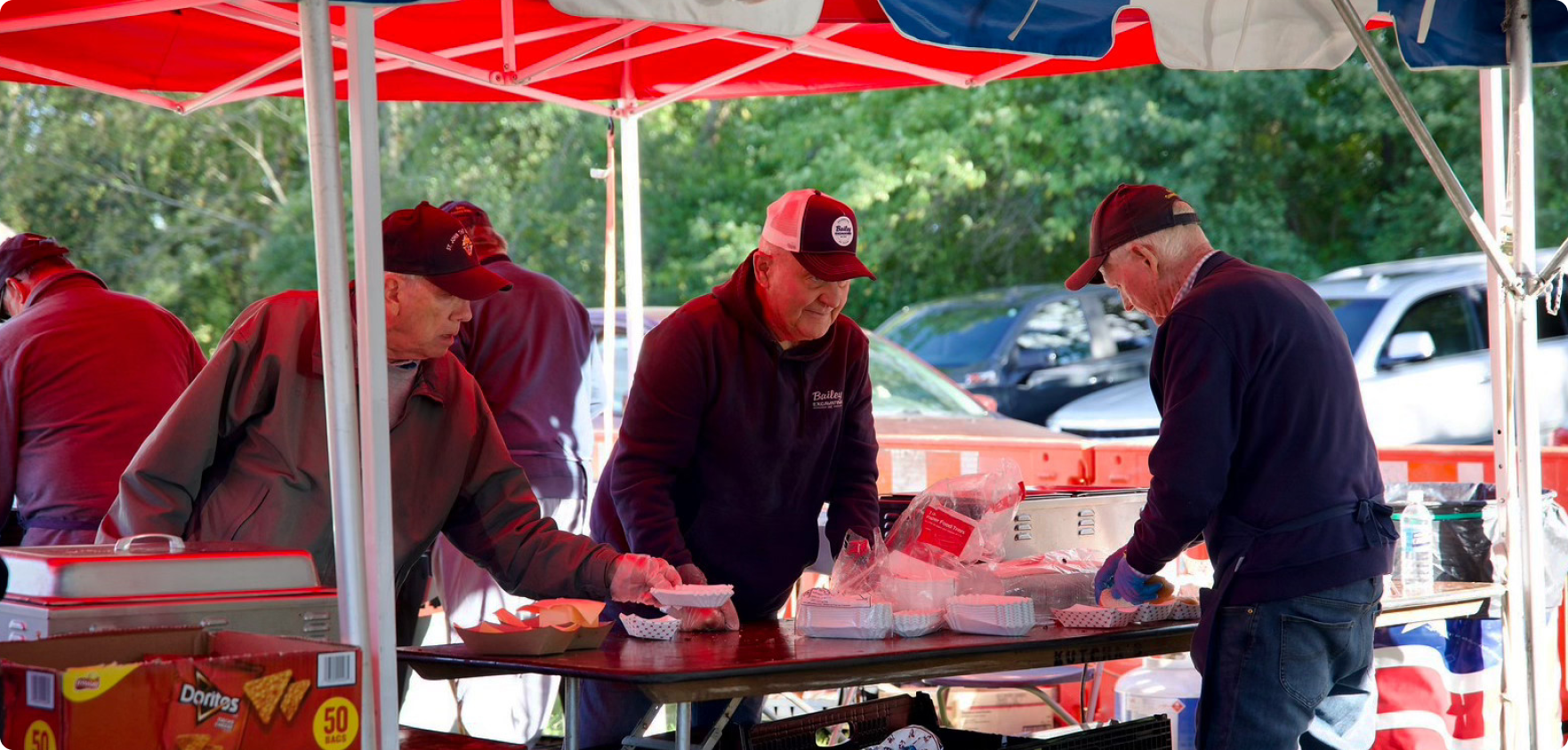 Non-profit food vendors serving food to the attendees.
